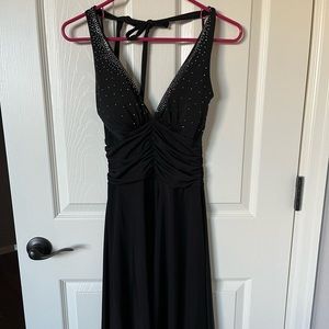 Black dress with rhinestone accents.